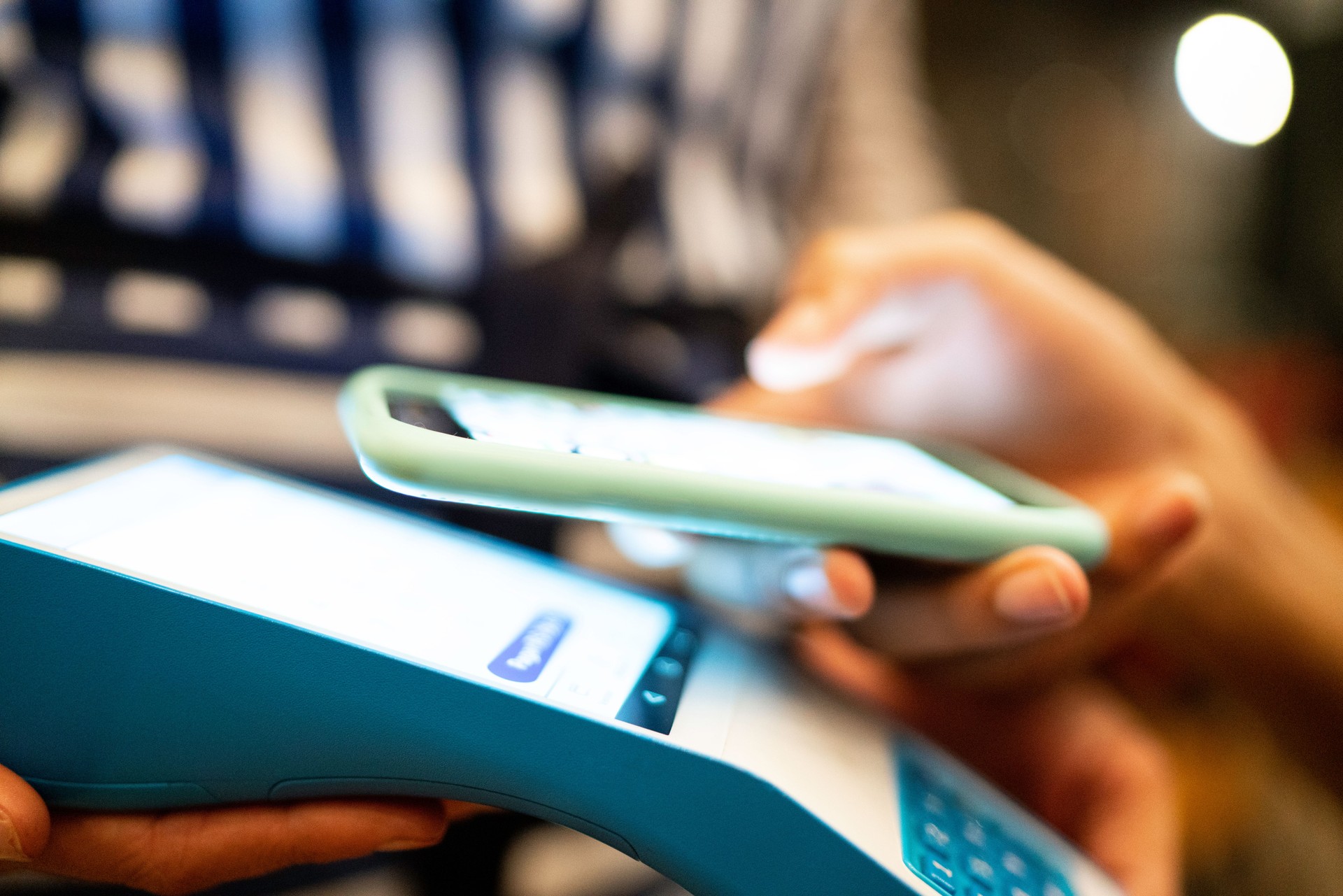 Paying in a instant with contactless payment with smartphone