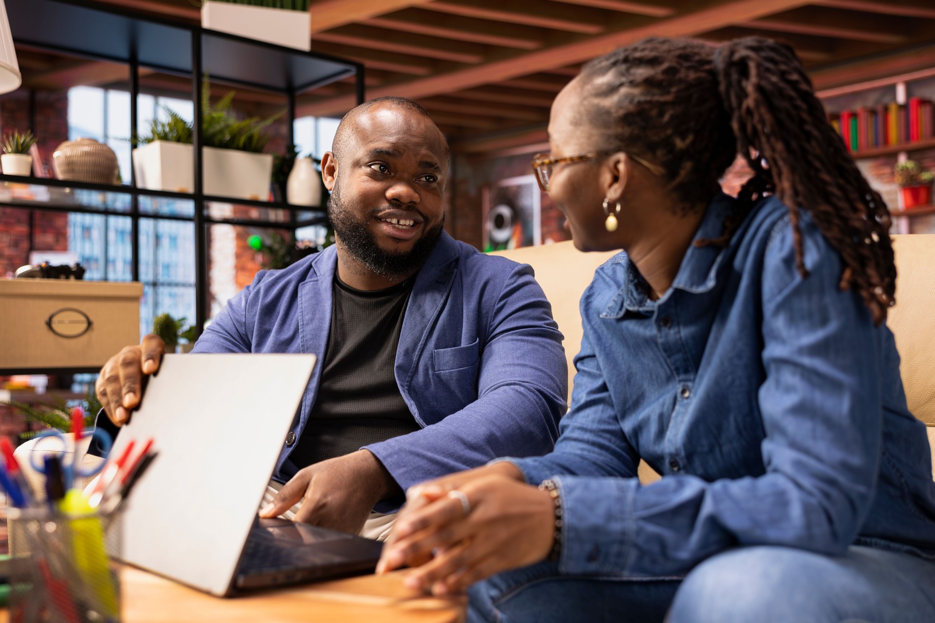 African American man asking his partner to take a break from remote work